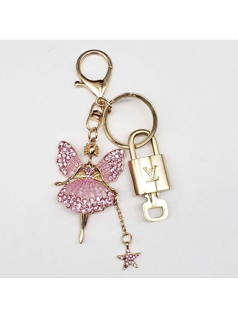 Authentic Louis Vuitton Lock & Key with unbranded Fairy Bagcharm, Keycharm